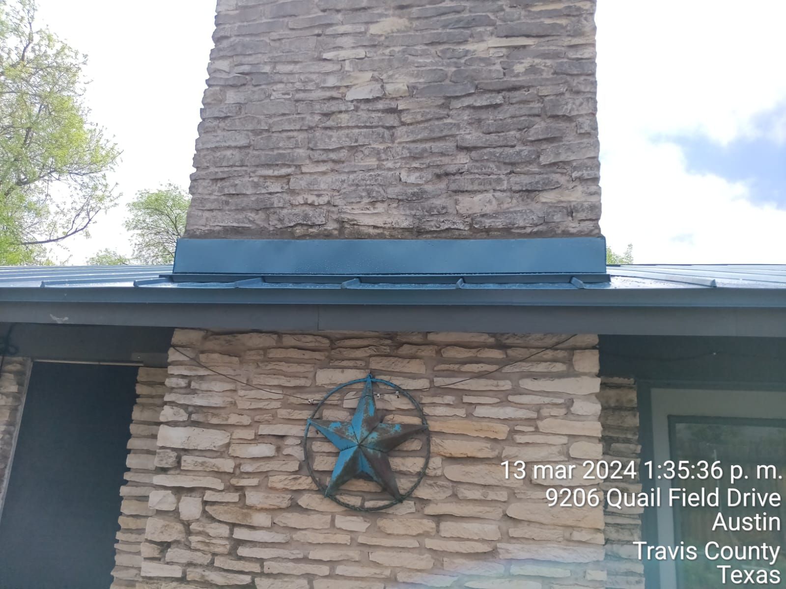 Metal roof and stone chimney repair detail, Big Texas Roofing and Solar