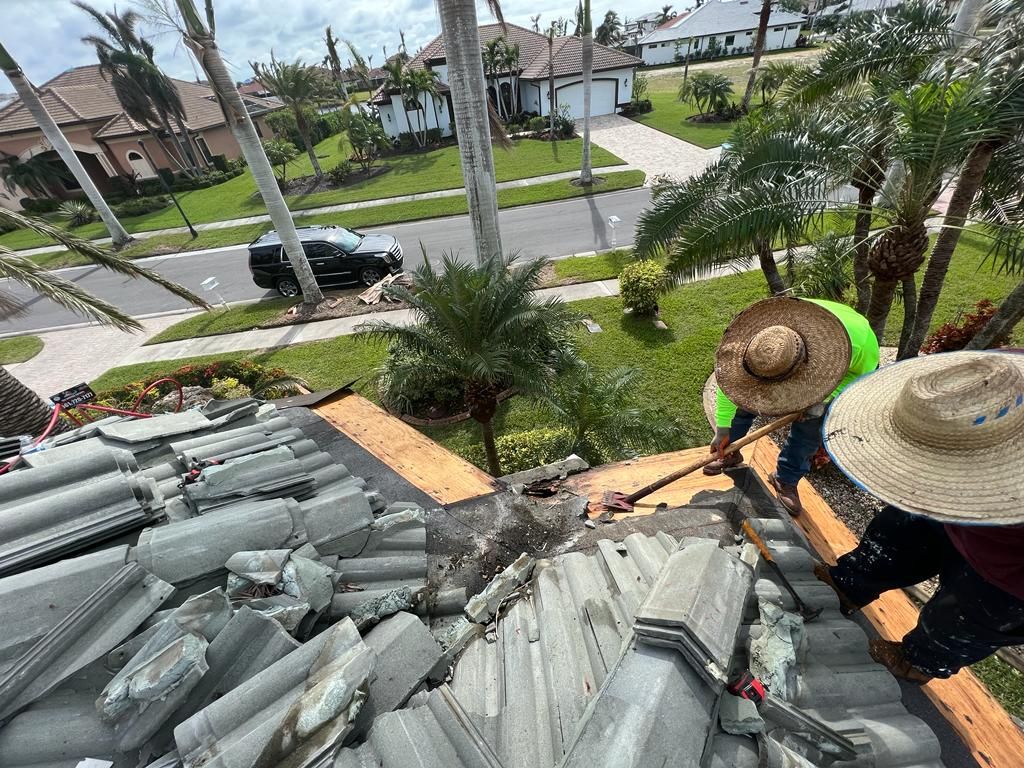 Big Texas crew repairing a tile roof, Big Texas Roofing and Solar