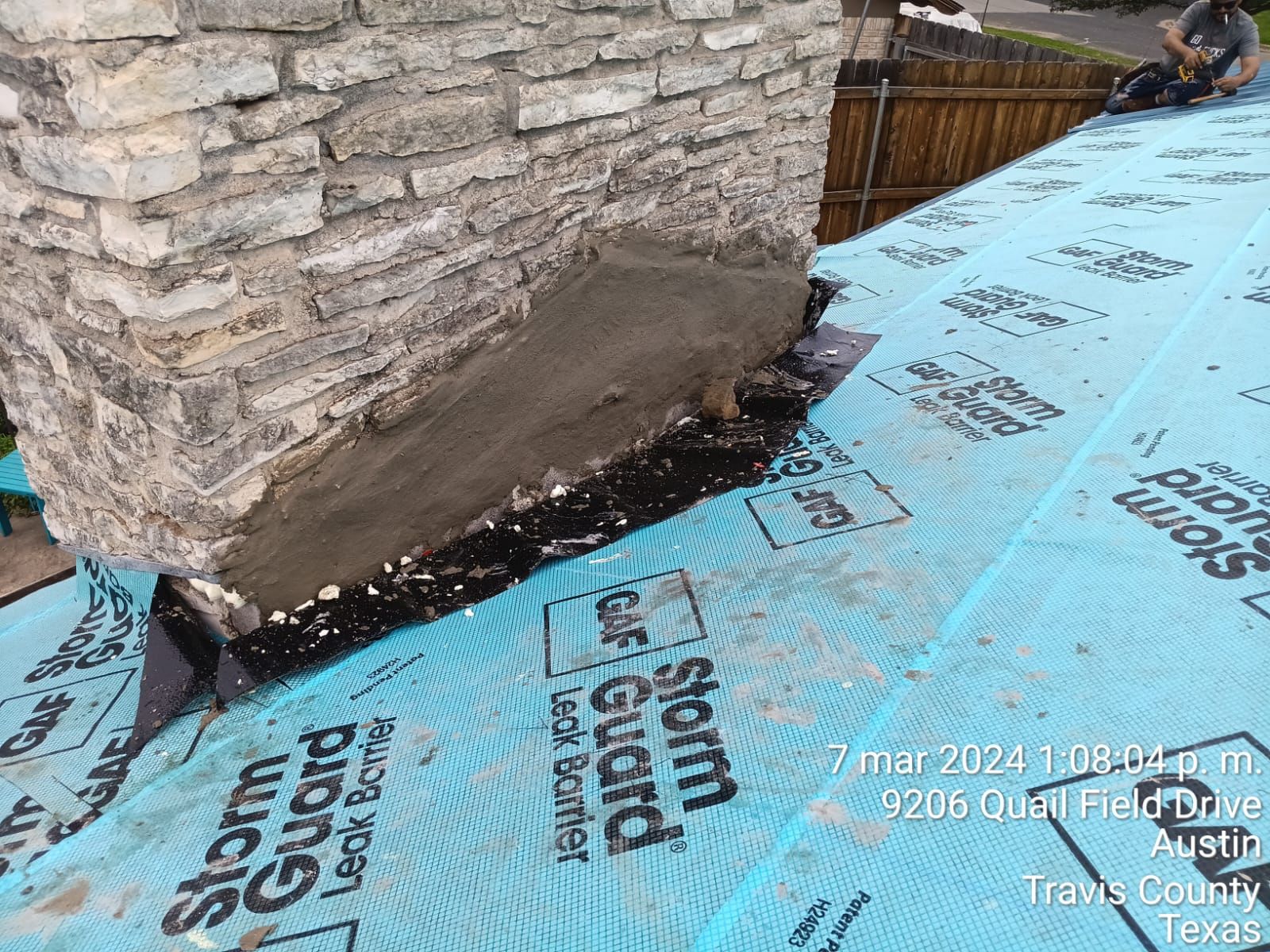 Underlayment and decking at a chimney base, Big Texas Roofing and Solar