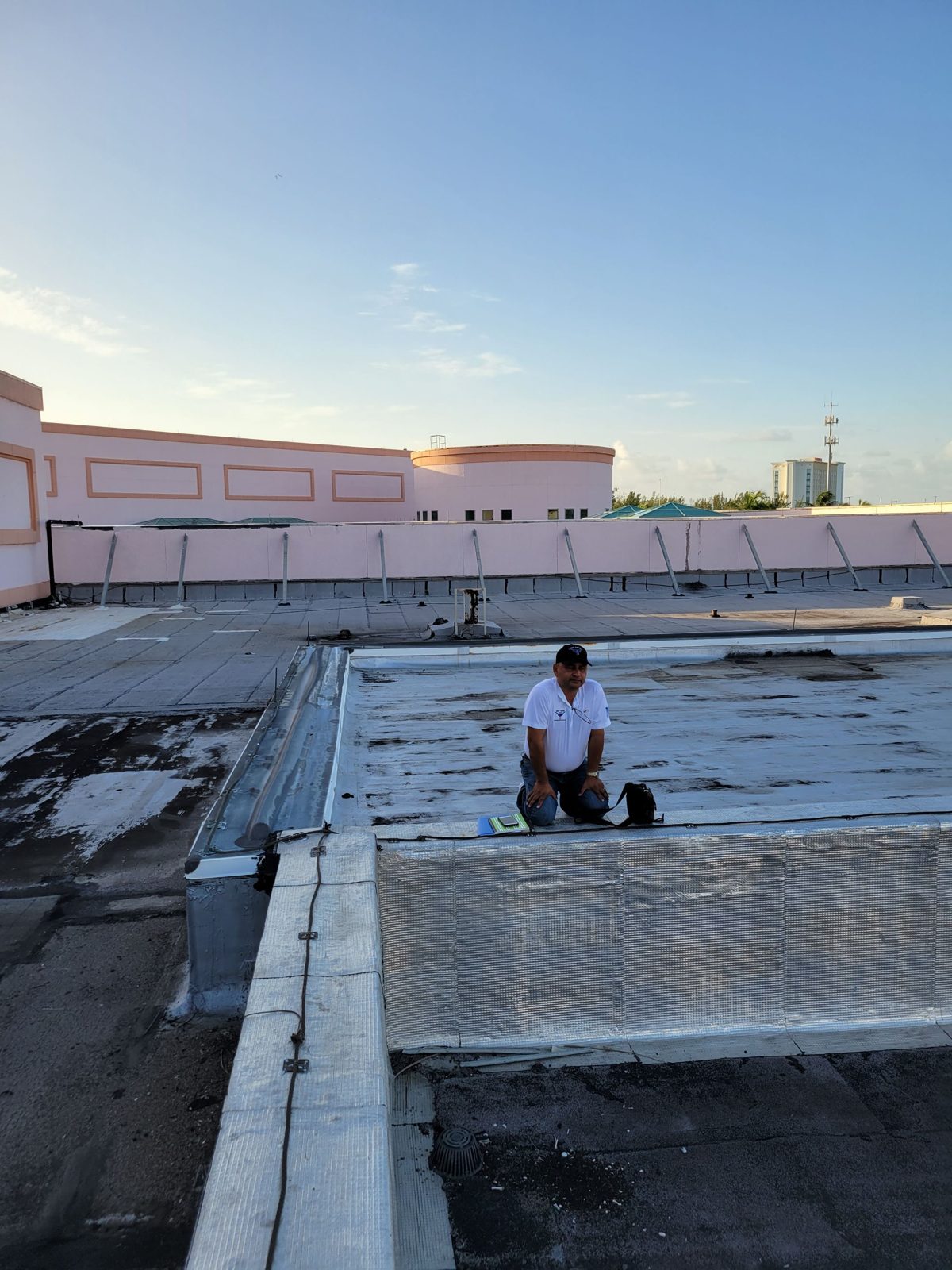 Inspector reviewing a roof level during project analysis, Atlantis Bahamas