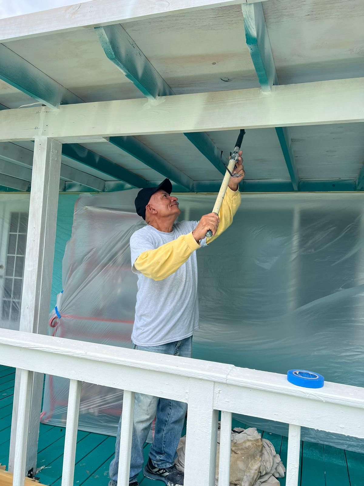 Crew member performing related ceiling restoration, Big Texas Roofing and Solar