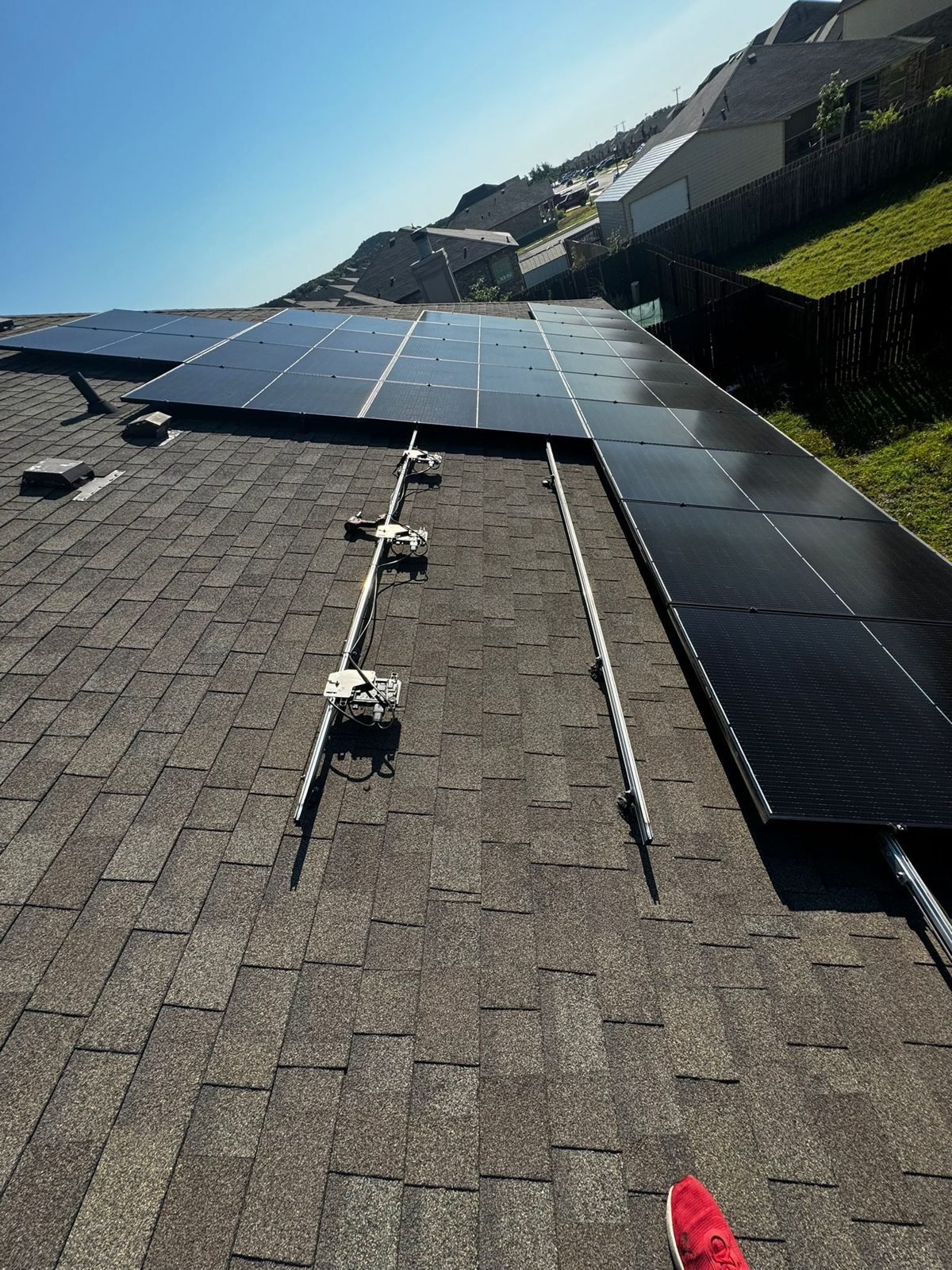 Panels going in over racking and microinverters, military veteran solar project
