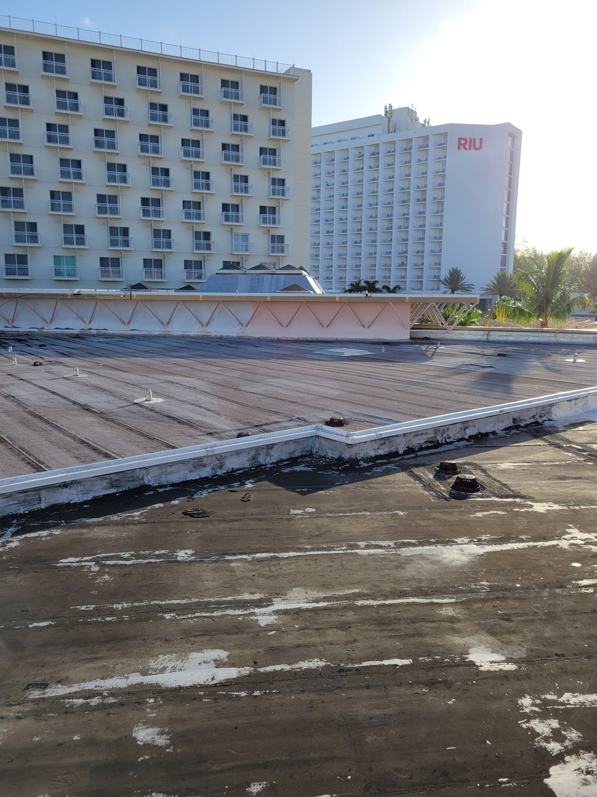 Weathered low slope roof beside the resort towers, Atlantis Bahamas