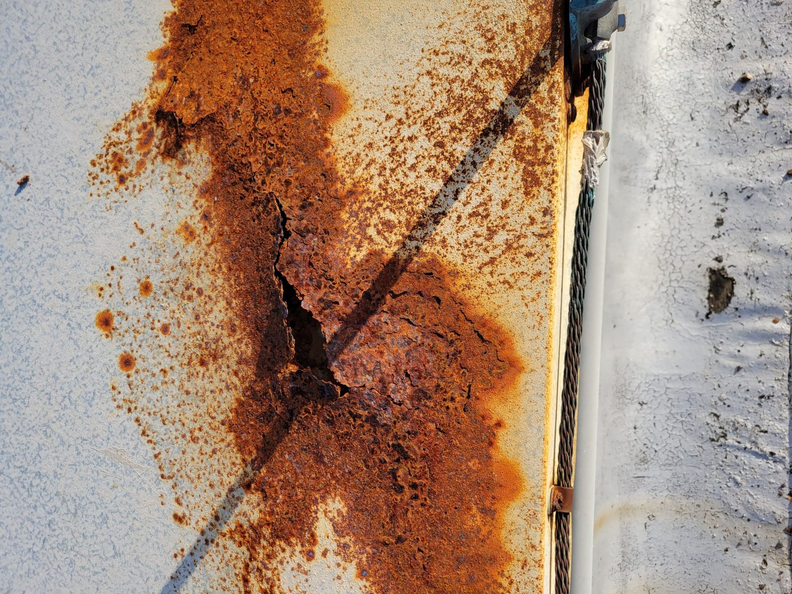 Corroded metal flashing found during inspection, Atlantis Bahamas