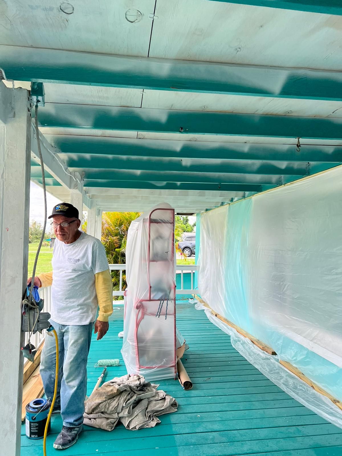 Crew working on a protected exterior ceiling, Big Texas Roofing and Solar
